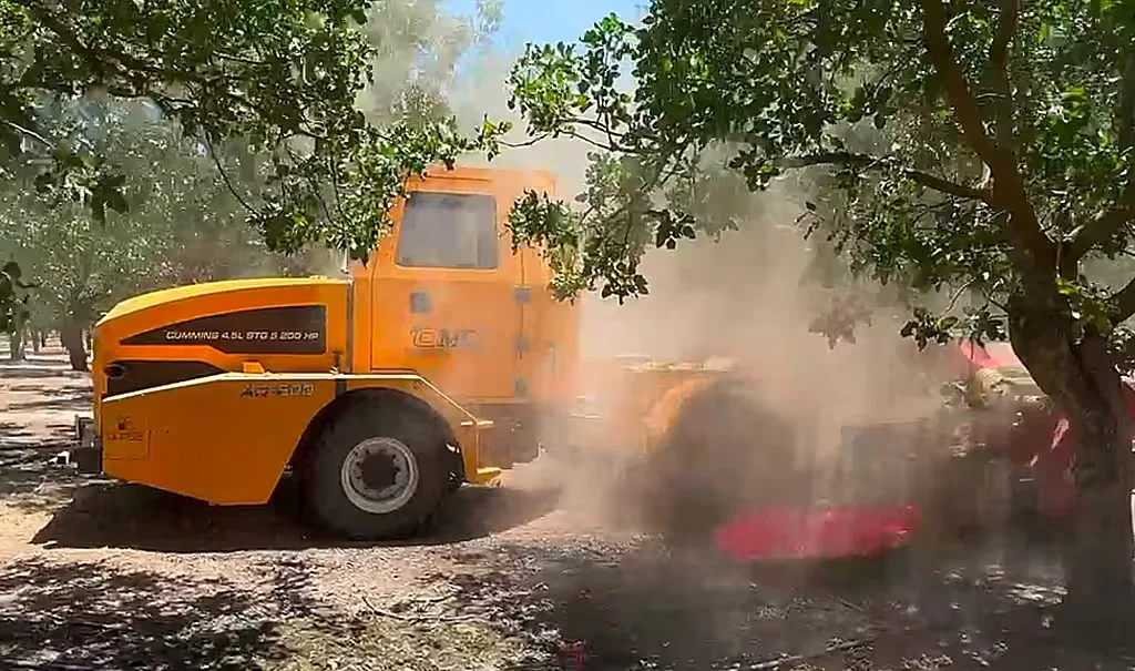 OMC AR-500 powered powered by Bonsai Intelligence in dusty orchard environment.